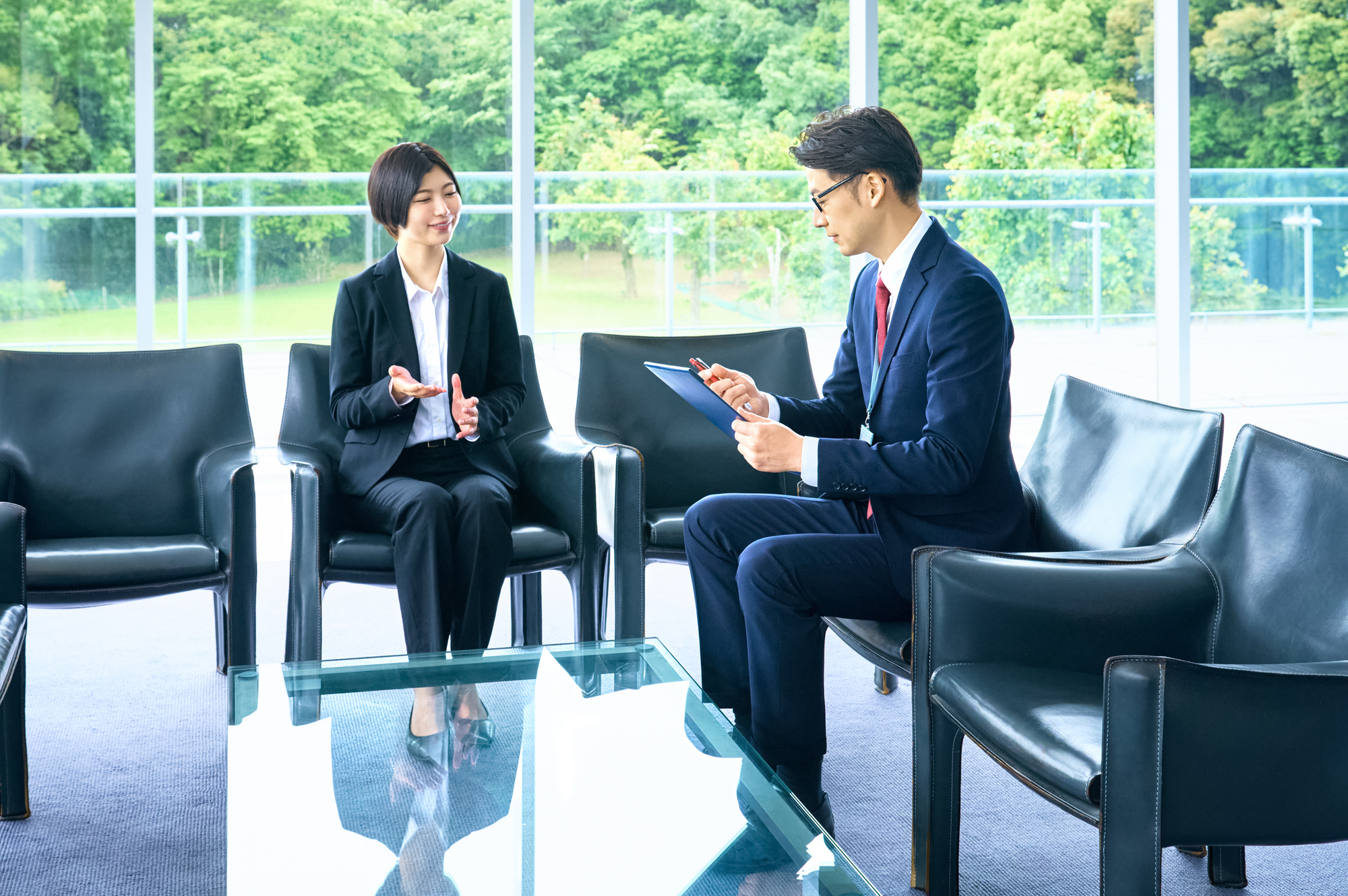 Candidate speaking with a recruitment consultant during an interview